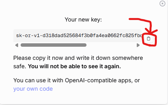 OpenRouter newly generated API key modal with the copy button highlighted.